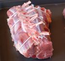 Rib and loin sections tied for grilling